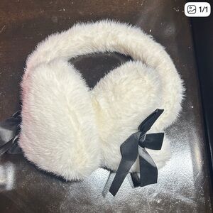 Urban Planet Cream Furry Earmuffs with Black Bow